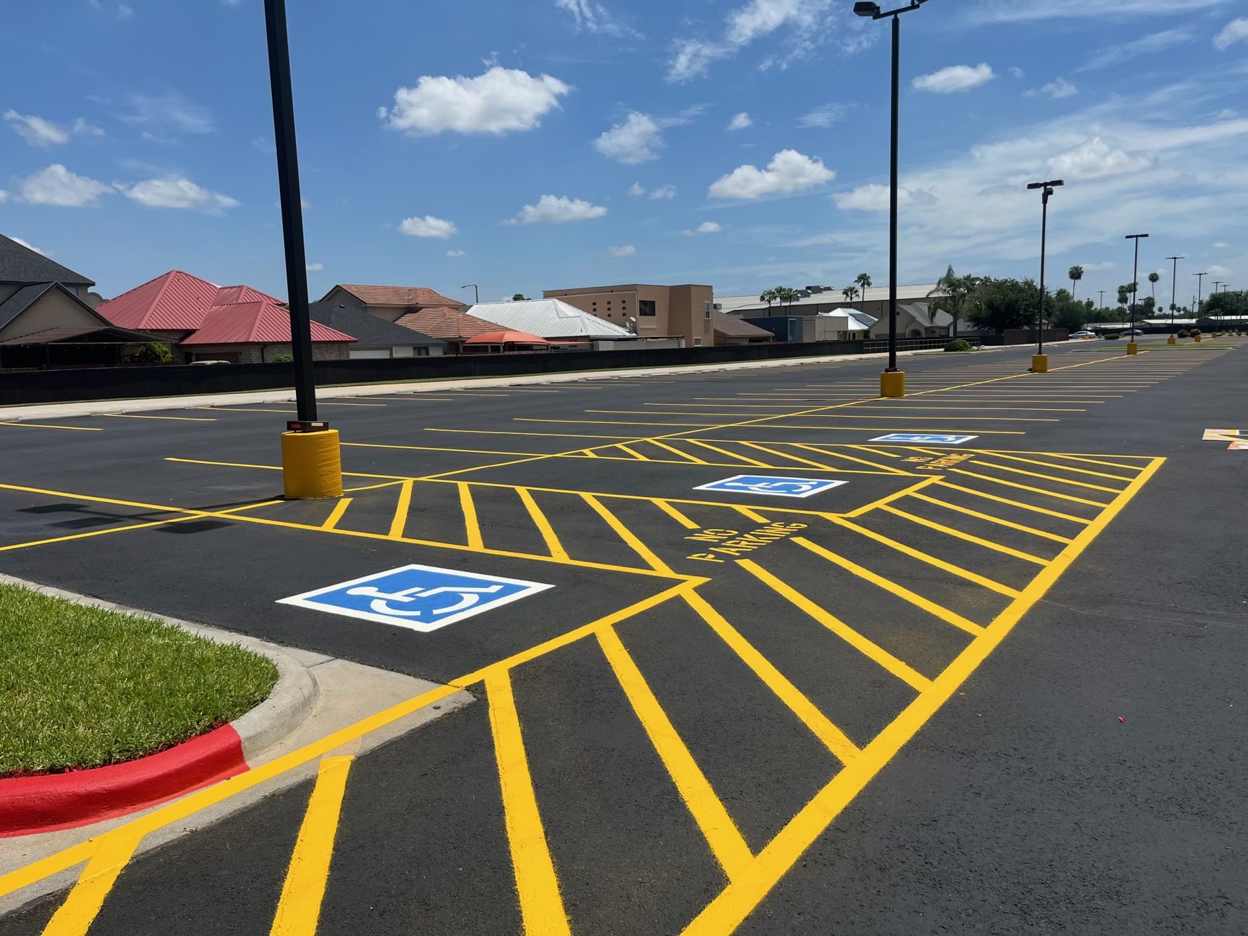 Fresh parking lot striping and accessible parking spaces
